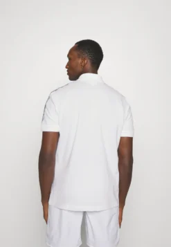 Lacoste Sport Tapered - Poloshirt - Blanc -Lacoste Sport 0c79a44981ed4b319ea4e3d25e539860 scaled