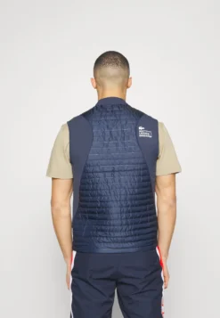 Lacoste Sport Reversible Vest Active - Bodywarmer - Bleu/Beige -Lacoste Sport 0ec10fa0c2294718abee2306fb29d47f scaled