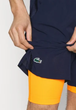 Lacoste Sport Tennis Short 2-In-1 - Korte Broeken - Navy Blue/Flashy Orange -Lacoste Sport 2512c12dadd54a3a92939578d284fa78 scaled