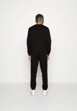 Lacoste Sport Pant Tapered - Trainingsbroek - Black -Lacoste Sport 2d05472148594fa9a4bfa541d6ae1af1 scaled