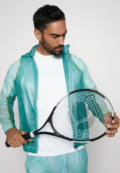 Lacoste Sport Tennis Tour - Sport T-Shirt - White/Pastille Mint-Lima -Lacoste Sport 3026309f0209480f84d8c2f66dd5f29c scaled