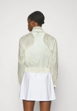 Lacoste Sport Tennis Jacket - Regenjas - Flour/Green -Lacoste Sport 324e850308c14bcb8bacc76964b01d2c scaled