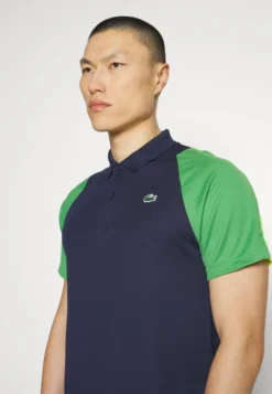 Lacoste Sport Tennis - Poloshirt - Bleu Marine/Vert/Jaune -Lacoste Sport 3251b7faf9f84988aa43134f9d2597e1 scaled