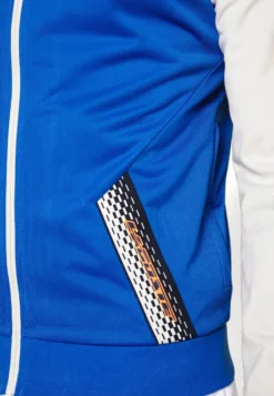 Lacoste Sport Tennis Jacket Tapered - Trainingsvest - Kingdom/Flour-Flour-Kingdom -Lacoste Sport 462738feeda14c4788d3fc6612f86830 scaled