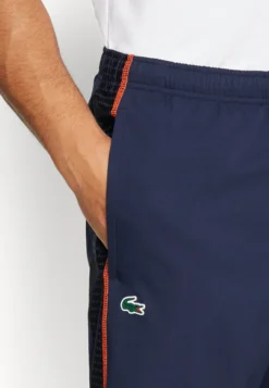 Lacoste Sport Tracksuit Tour - Trainingspak - Navy Blue/Flashy Orange -Lacoste Sport 5e460769e53c43748e7dd2a513ed4960 scaled