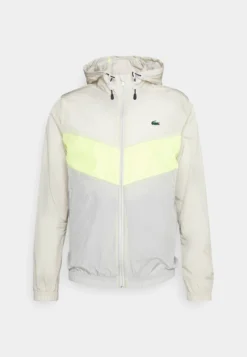 Lacoste Sport Jacket Active - Regenjas - Camel/Yellow/Taupe -Lacoste Sport 71681e57dcfe47c48a5cca66e0b8435d scaled