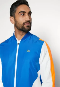 Lacoste Sport Tracksuit - Trainingspak - Kingdom/Flashy Orange-Flour -Lacoste Sport 7d75c1413dbb478abd8b927cb152497d scaled