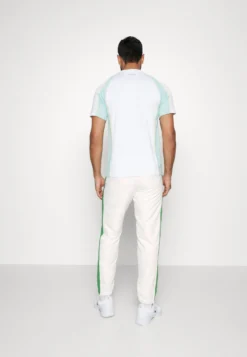 Lacoste Sport Tennis Pant - Trainingsbroek - Flour/Tarragon -Lacoste Sport 9eeab01d4eda4cb1a8897bdbb836810f scaled