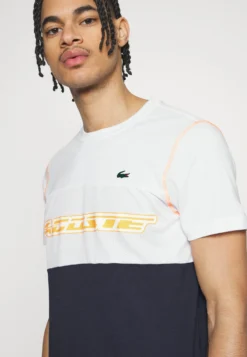 Lacoste Sport Sport T-Shirt - White/Blue Night/Flashy Orange 9 Lacoste Sport Sport T-Shirt - White/Blue Night/Flashy Orange -Lacoste Sport a07f82bbc2cb4343a4dd4ed50e981f2a scaled