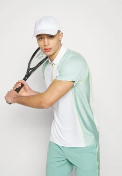 Lacoste Sport Tennis Tour - Poloshirt - White/Pastille Mint Lima -Lacoste Sport a0ceedbd104f4cd28eba02506e5b621c scaled