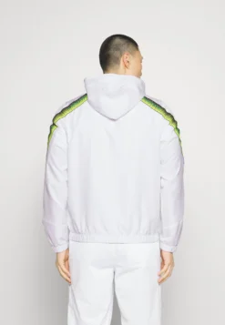 Lacoste Sport Tennis Jacket Tapered - Trainingsvest - Blanc/Bleu Marine/Jaune -Lacoste Sport c17e99bd466843a3a62fc048cd3b73ed scaled