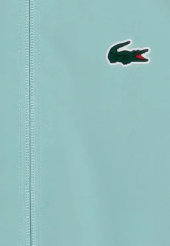 Lacoste Sport Unisex - Trainingspak - Pastille Mint/Florida/White/Lima -Lacoste Sport d062284d5af34d8aa9e0f1362df85309 scaled