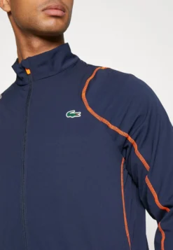 Lacoste Sport Tracksuit Tour - Trainingspak - Navy Blue/Flashy Orange -Lacoste Sport db4c25a27870474db17fb07d14d4cc69 scaled
