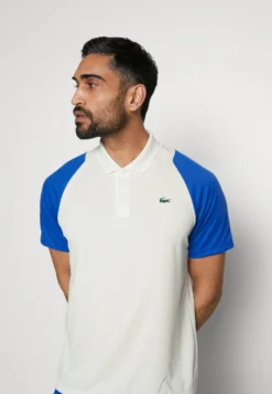 Lacoste Sport Tennis - Poloshirt - Flour/Kingdom/Flashy Orange -Lacoste Sport de583e97ab7a42e08d9cb1a17ece6376 scaled