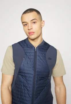 Lacoste Sport Reversible Vest Active - Bodywarmer - Bleu/Beige -Lacoste Sport e0b6fa6d689d47f591b64185a960dcf6 scaled