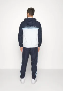 Lacoste Sport Tracksuit Hooded- Trainingspak - Navy Blue/White -Lacoste Sport ea8ab4edd9484984a32c07703ab718f1 scaled
